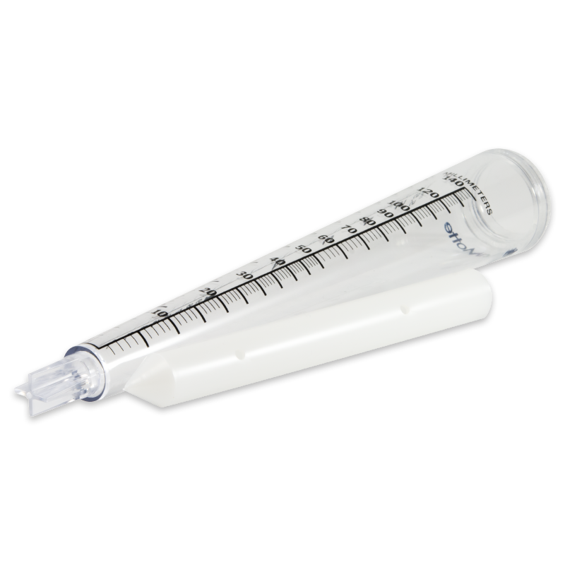 A clear, conical laboratory centrifuge tube with black measurement markings and a screw cap, resembling a tapered rain gauge, rests on a white angled tube rack.