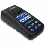 A black handheld digital water tester, Model DC1500 Copper Colorimeter Lab - 3245, with a display screen showing measurement readings, blue control buttons, and the brand LaMotte visible on the device.