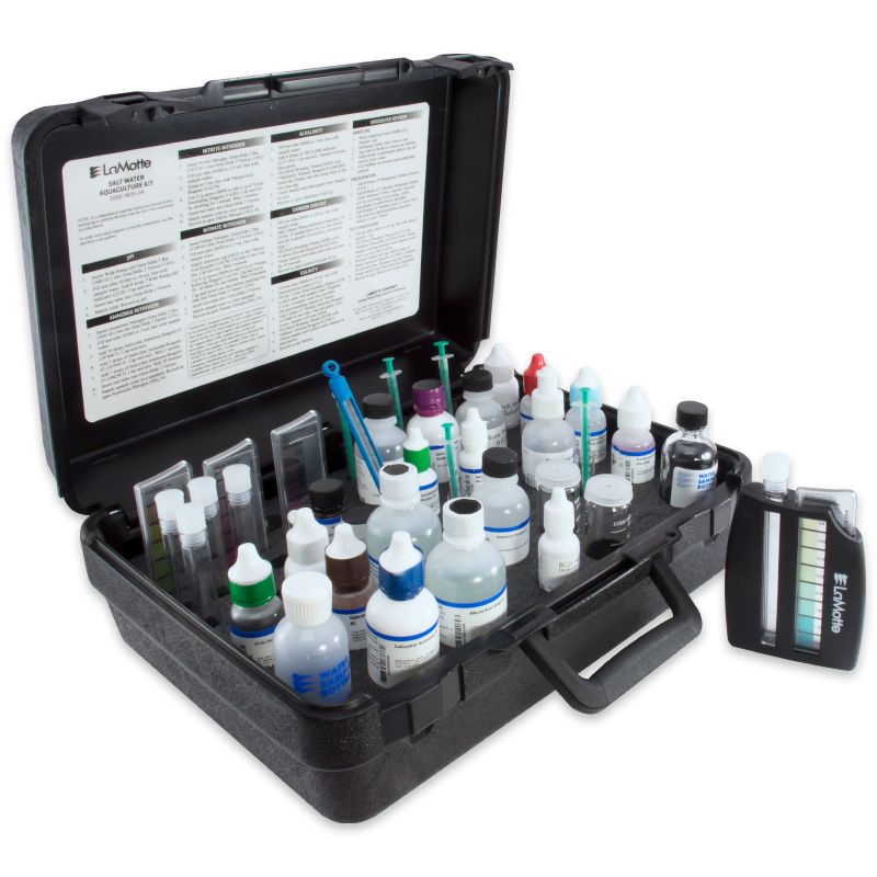 A black carrying case labeled Salt Water Aquaculture Outfit Model AQ-4 - 3635-05, filled with small bottles, droppers, test tubes, and color cards for water testing. The case lid displays instructions, with a separate color chart beside the kit.