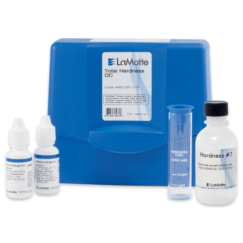 A LaMotte Total Hardness Test Kit - 4482-DR-LI-01 with a blue carrying case, two small reagent bottles, a clear hardness tube, and a larger bottle labeled Hardness #7, all neatly arranged in front of the case.