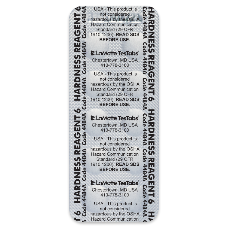 A blister pack labeled HARDNESS REAGENT TesTabs with product information and safety notices printed in black text on a silver background. The package mentions OSHA standards and provides contact details for LaMotte.