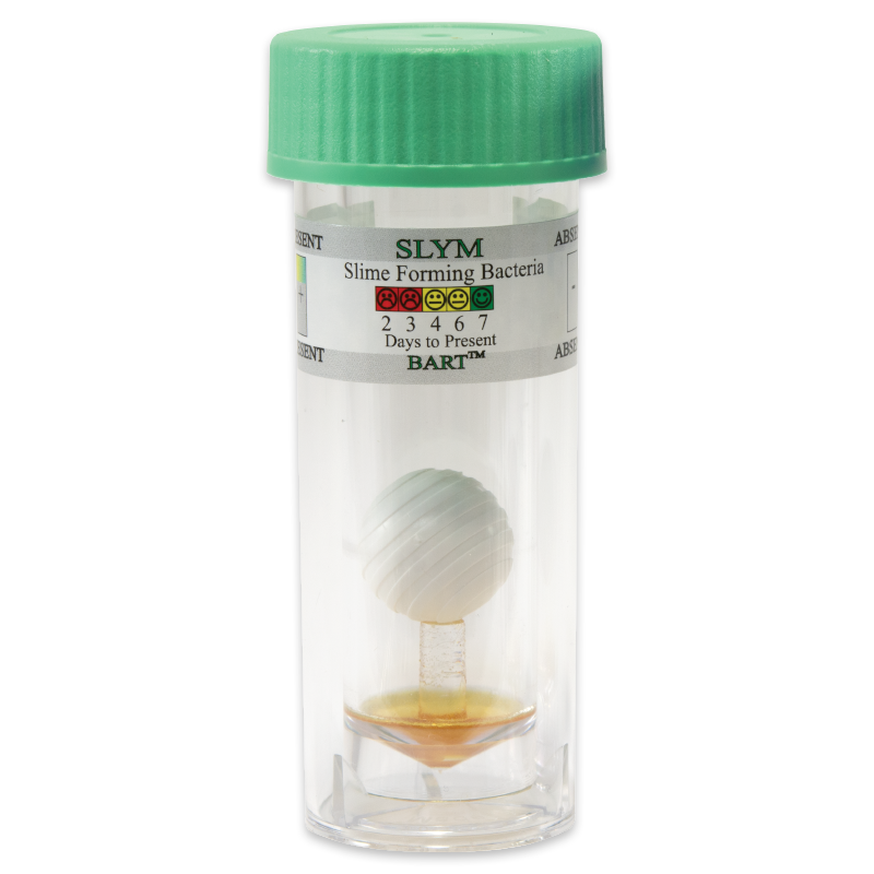 A clear plastic vial with a green lid, containing a ball on a stick and orange liquid at the bottom. The label reads Slime Forming Bacteria - SLYM-BART - 5-0026 with a color-coded chart and days-to-present indicator.