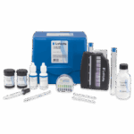 The Cyanide in Water Test Kit - 7387-02 includes bottles, droppers, test strips, a color comparator, test tubes, and a blue carrying case—all clearly labeled for precise water testing.